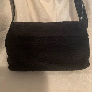 Carlo D’Santi shoulder bag.